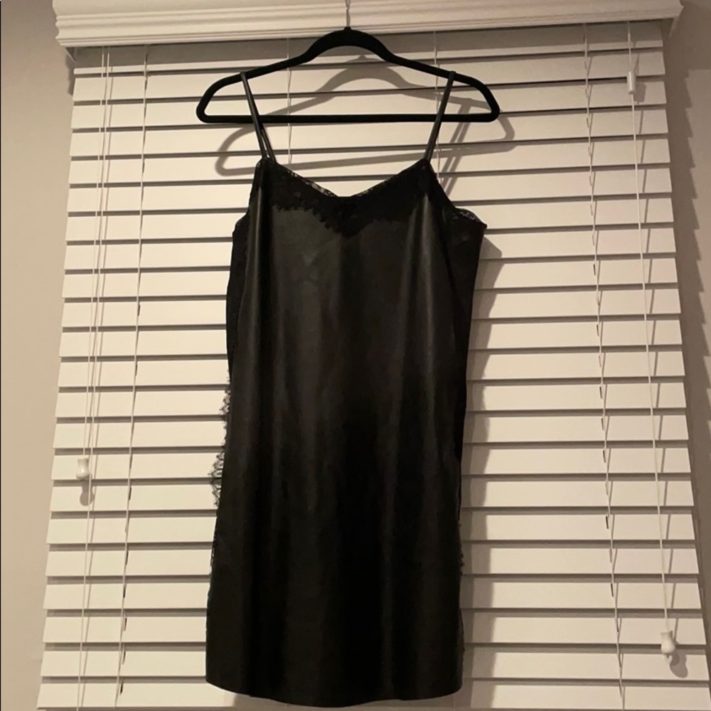 Black leather dress with lace finishings